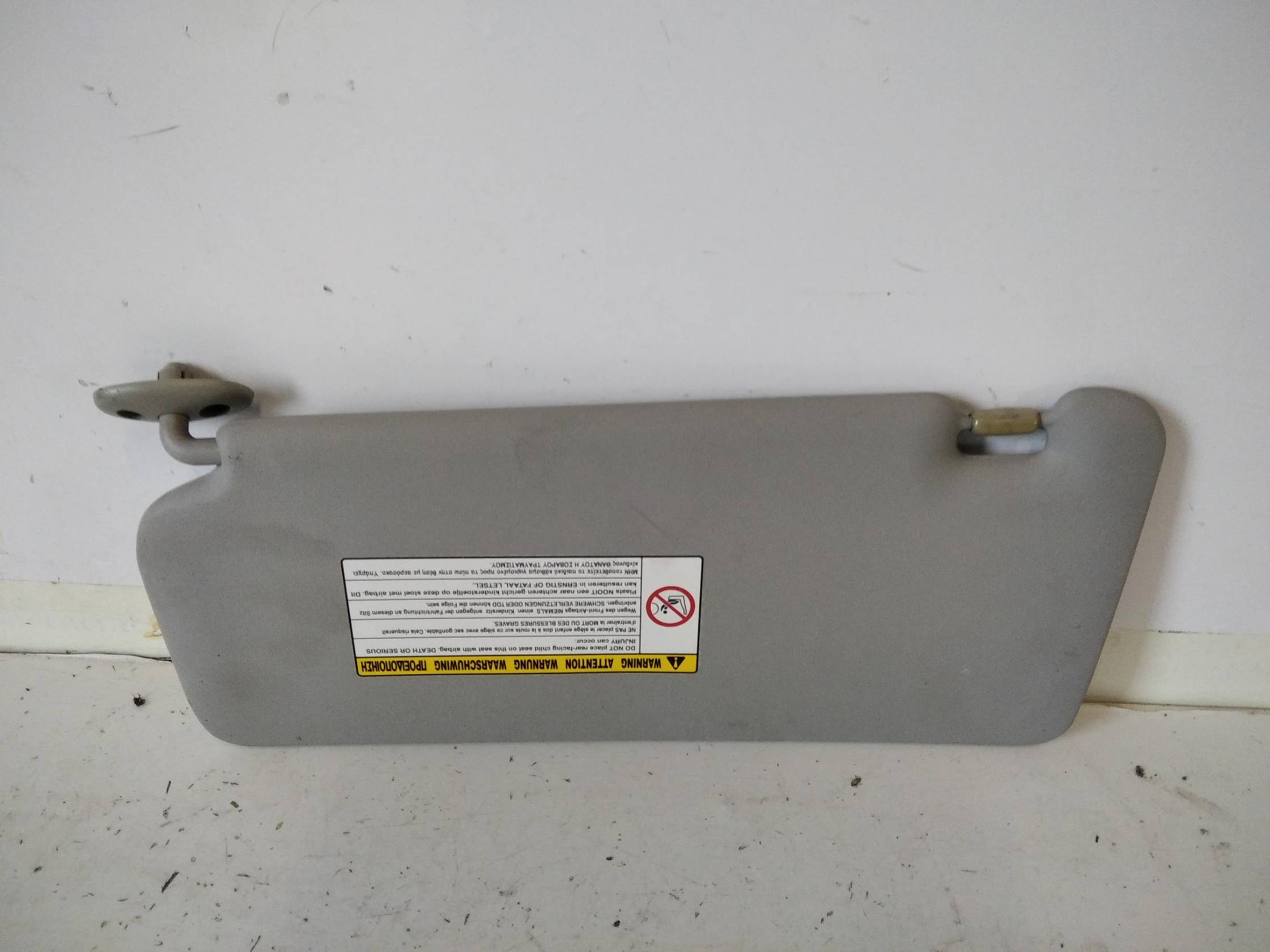 Aletta parasole parabrezza dx.